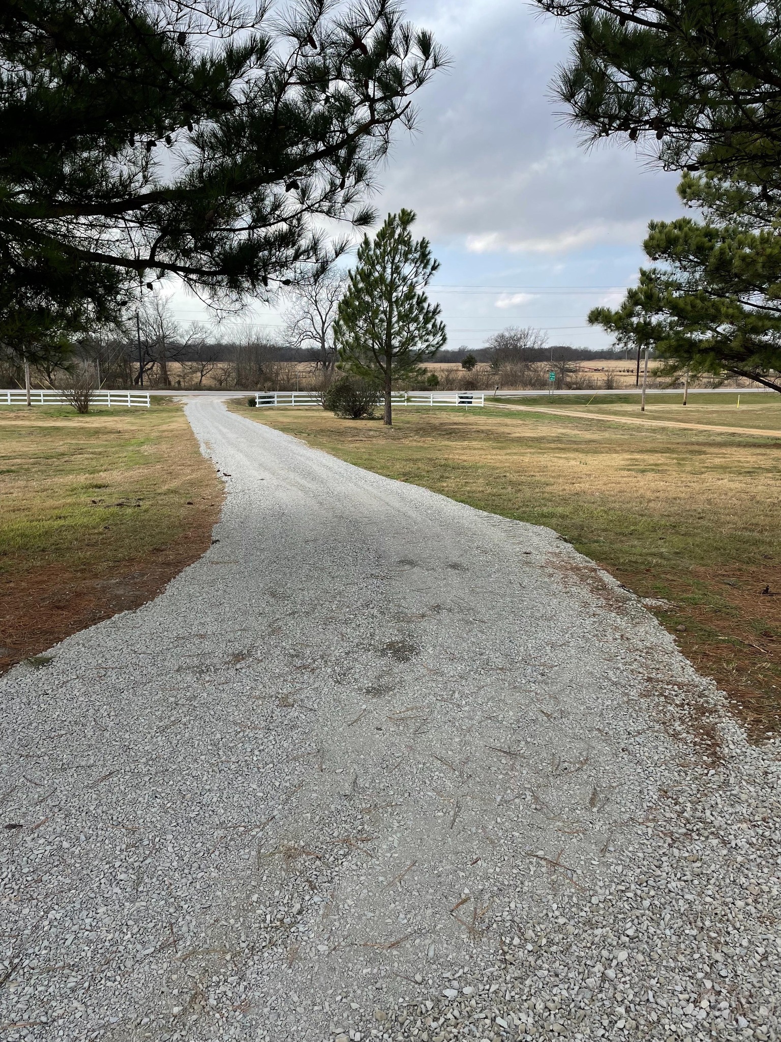Gravel driveway and fencing by F'Amos Construction